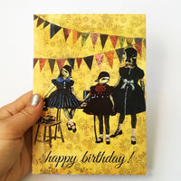 Hand holding vintage inspired greeting card