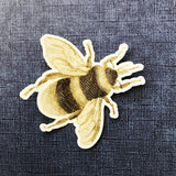 Bee Vinyl Sticker on Blue Background