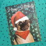 Pug in a Santa Hat Greeting Card. Text reads Happy Holidays.