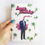 hand holding retro men's greeting card. Flamingo illustration, flamingo dressed in suit, text says happy birthday