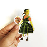 Hand holding duck sticker. Duck wearing dress and holding flowers. Dressed up duck, dressed up animal art, cute animal sticker.