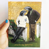 Hand holding illustrated dolphin card. Retro dolphin illustration. Gay Card. "You're My favorite"