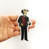 Hand holding illustrated dog vinyl sticker. Retro business casual dog, holding a cup of coffee.