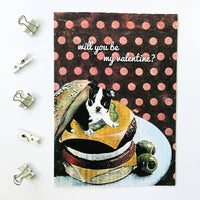 Valentine Card with Boston Terrier Sitting in a Cheeseburger. Reads, "Will you be my Valentine?"