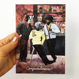 Hand holding a handmade greeting card. Collage illustration of dogs in a bar. Dogs wearing clothes.