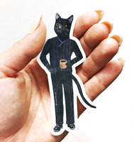 Hand holding a dressed up cat laptop sticker